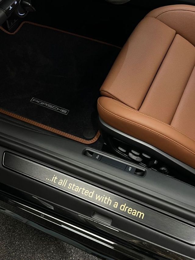 the inside of a car with leather seats and an inscription on the floor that says it all started with a dream