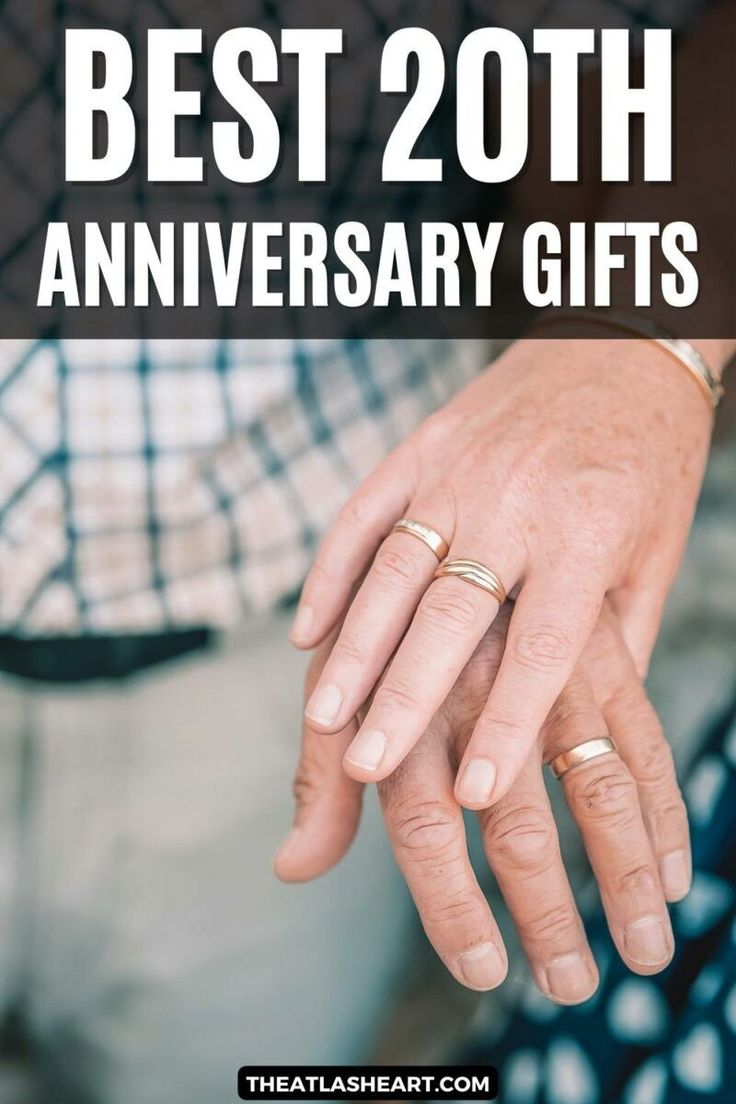 A wrinkled hand resting on top of another hand. Both hands have golden rings on their ring fingers with the text overlay, ‘Best 20th Anniversary Gifts’. Anniversary Rings For Her 20th Gold, 20 Years Married Anniversary Gifts, 20th Anniversary Platinum Gifts, 20th Year Anniversary Ideas, 20 Year Anniversary Gifts For Wife, 20th Anniversary Ideas For Parents, 20 Years Wedding Anniversary Ideas, 20th Anniversary Ring, 20 Th Wedding Anniversary Ideas