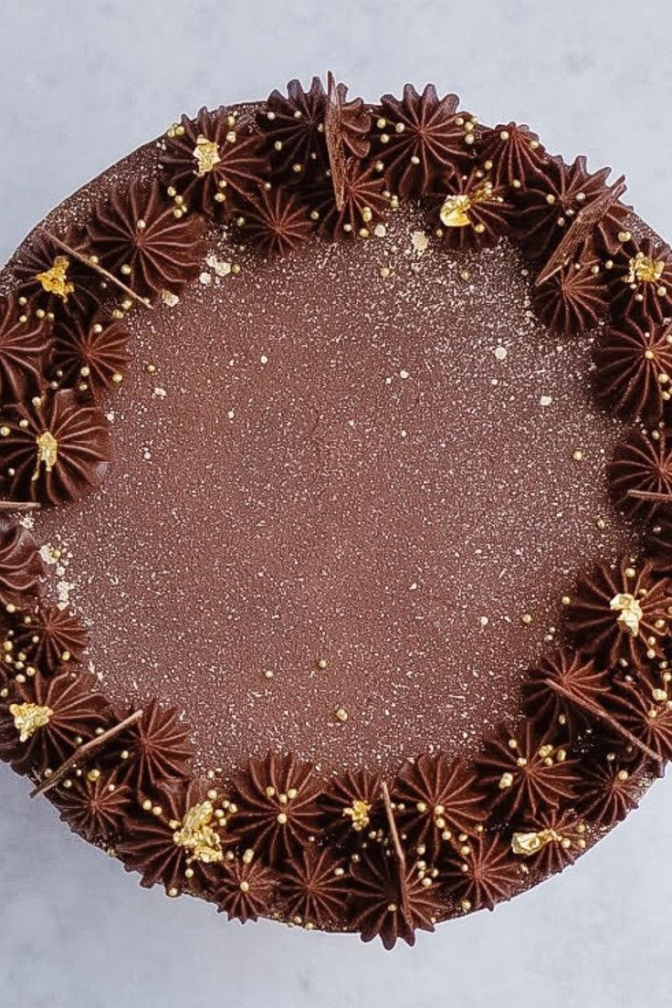 a cake with chocolate frosting and sprinkles