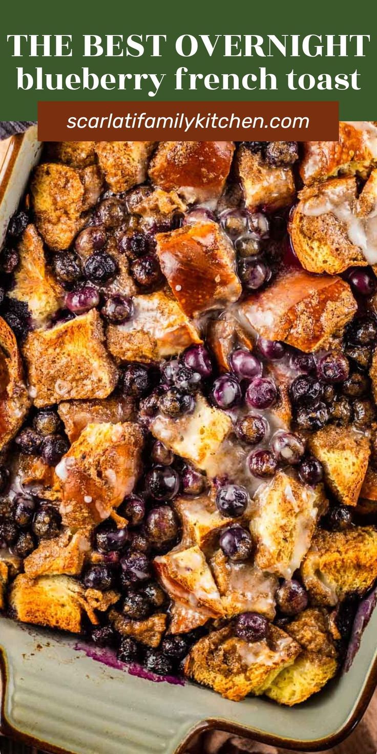 the best overnight blueberry french toast in a casserole dish with fresh blueberries