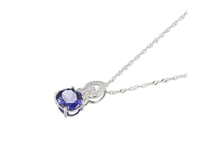 Bella Luce® Esotica™ tanzanite and white diamond simulant 6.65ctw oval and round, platinum over sterling silver pendant with chain. Pendant measures approximately 0.81" L x 0.43" W. Includes a 18" L x 0.03" W singapore chain that has a 2" extender and lobster claw clasp closure. Silver Tanzanite Necklace With Diamond Accents, Silver Tanzanite Round Stone Jewelry, Elegant Round Tanzanite Jewelry, Pendant With Chain, Diamond Simulant, Chain Pendant, Sterling Silver Pendant, White Diamond, Lobster Claw