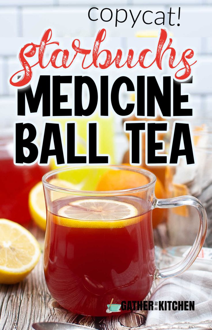 a cup of starbuck's medicine ball tea with lemons on the side