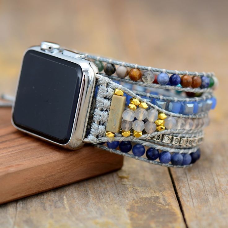 This exquisite Aquamarine Apple Watch Strap is a timeless and luxurious accessory crafted by hand. Featuring a sparkling gem, this handmade piece offers a unique way to add elegance and style to your device. Material: Jasper, Crystal, Aquamarine, Sodalite, Metal. MEASUREMENTS: small: 78cm; medium: 84cm; large: 88cm+3knots Fit For： Apple Watch Series 8 7 6 5 4 3 2 SE This item is covered by warranty and 30 days return. Delivery between 9am-6pm, Monday to Friday, your order will be shipped in 2-3 Bohemian Silver Bracelet Strap Watch Bands, Bohemian Silver Watch Bands With Bracelet Strap, Bohemian Style Adjustable Watches As Gift, Bohemian Silver Watch Band As Gift, Bohemian Silver Watch Bands As Gift, Adjustable Bohemian Style Watches As Gift, Elegant Adjustable Watch Accessories For Gift, Silver Watch Bands With Leather Strap, Luxury Adjustable Apple Watch Band For Gift