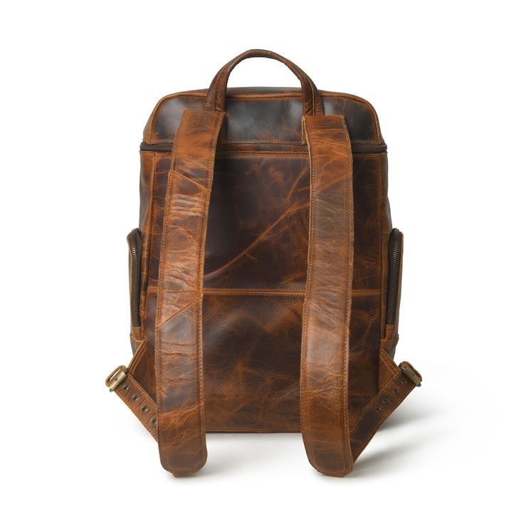 Trustpilot Our handmade leather Alpha backpack is the perfect choice for your travel need. Carry your travel essentials in a trendy and convenient way with our super spacious backpack bag. The bag comes with multiple pockets and a main zipper compartment which gives easy access to the inside main compartment. The backpack has two adjustable straps on the back for adjusting as per your comfort. The premium backpack is crafted from high-grade buffalo leather giving it a vintage and eye-catchy look Leather Backpack For On-the-go, Classic Leather Backpack With Adjustable Strap For Travel, On-the-go Leather Backpack, Leather-backed Backpack Shoulder Bag For Trips, Leather Backed Shoulder Bag Backpack For Trips, Leather-backed Shoulder Bag Backpack For Trips, Classic Backpack With Luggage Sleeve For Trips, Brown Standard Backpack Travel Bag, Leather Backpack With Leather Lining For Travel