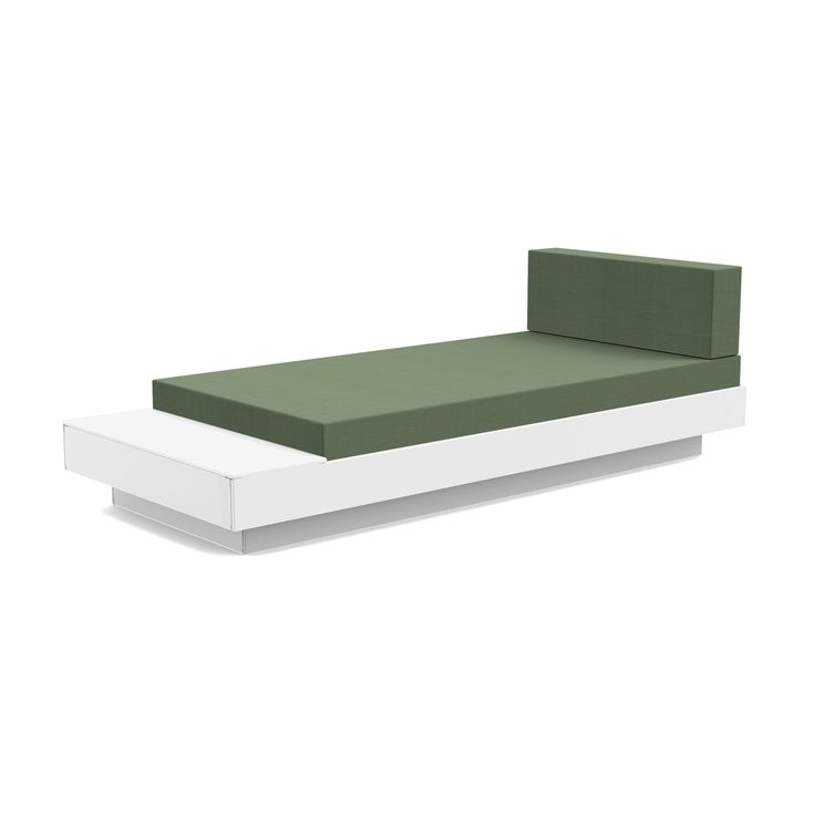 a white and green bed with no sheets on it