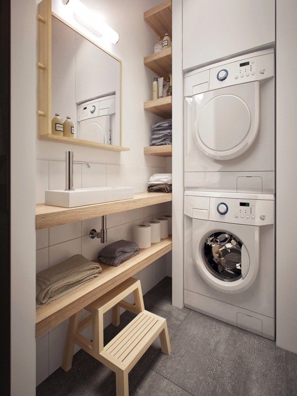 an image of a washer and dryer in a small room that is very clean