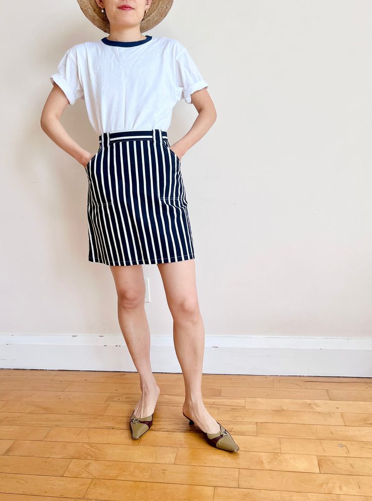 Vintage white and navy stripe skirt with front pockets. So summer! Pair it with a white tee! made in France Size tag size FR 38 100% cotton Waist: 13" Hip: 19" Length: 17.5" Summer Striped Cotton Skirt, Striped Cotton Skirt For Summer, Striped Cotton Relaxed Skirt, Striped Relaxed Skirt For Day Out, Summer Workwear Skirt With Vertical Stripes, Fitted White Skirt With Striped Hem, Casual Cotton Skirt With Vertical Stripes, White Vertical Stripes Skirt For Summer, Striped Lined Skirt For Workwear