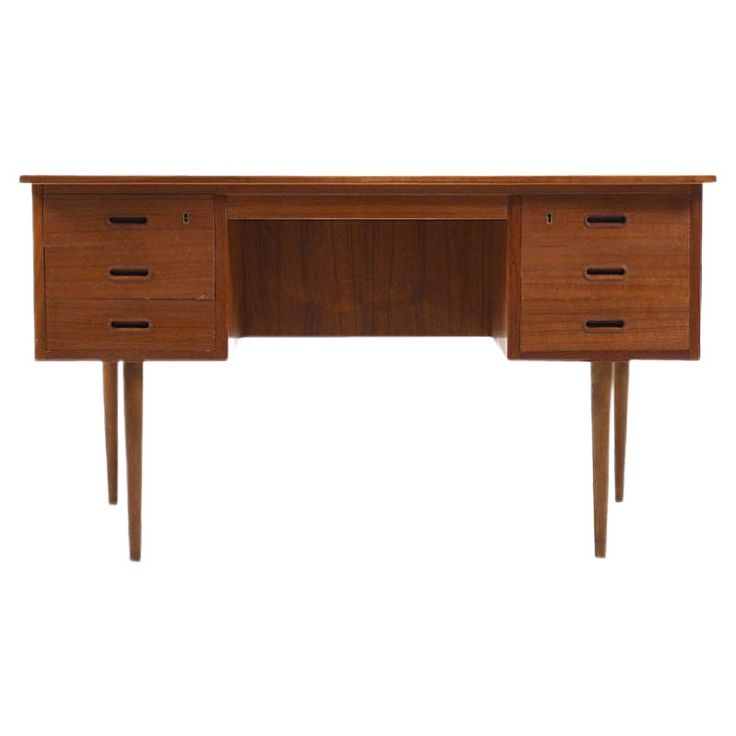 a wooden desk with three drawers and two legs