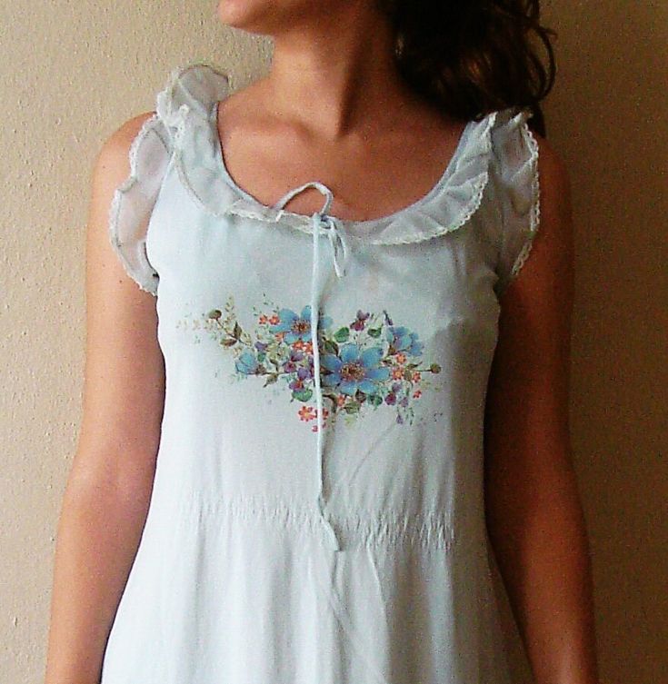 Vintage Nightgown with Embroidery and lace, good vintage condution Shows very little wear or age. tires now no longer in the waist.  It has made a torn seam on front knee it was mine when I was 18 size large XL.  Model size medium Measurements take an flat Armpit to armpit..19"  48cm Length 51"  127cm Ready to ship The items will be shipped in Turkey  after payment within 2-3 business days , and it normally will take 10-25 business days for delivery(USA) 5-10 day EU If you have a question you wa Light Blue Sleeveless Cotton Sleepwear, Sleeveless Light Blue Cotton Sleepwear, Vintage Sleeveless Loungewear Dresses, Vintage Sleeveless Spring Sleepwear, Vintage Sleeveless Ruffled Sleepwear, Vintage Sleeveless Sleepwear For Spring, Vintage Sleeveless Nightgown For Spring, Light Blue Sleeveless Sleep Dress, Sleeveless Cotton Vintage Nightgown