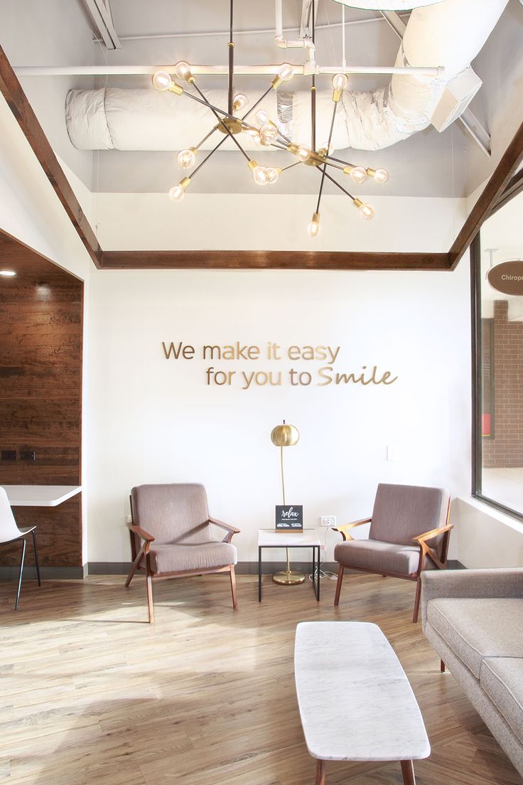 Dental Office Decor Ideas Accent Walls, Doctor Office Seating, Medical Clinic Interior Design Waiting Area, Selfie Wall Dental Office, Dental Clinic Interior Reception, Welcoming Waiting Room, Reception Decorations Office, Doctors Office Reception Area, Dentist Office Waiting Room