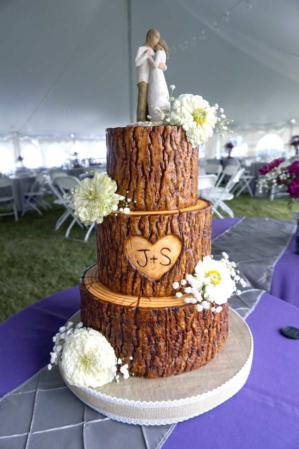 a wedding cake made to look like a tree stump