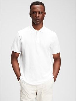 Soft, stretch pique knit with moisture-wicking properties.  Short sleeves with flat rib-knit cuffs.  Flat rib-knit polo collar.  Button placket.  Side vents at hem.  #223627 Straight, easy fit.  Hits at the hip.  Models are 6'1"–6'2" 185-188 cm) with a 31" 79 cm) waist and 32–33" 81–84 cm) inseam, and are wearing Gap Classic Fitted Gap Tops, White Short Sleeve Polo Sweater For Work, Fitted Collared Gap Tops, Relaxed Fit Collared Polo Sweater, Solid Collared Polo Sweater With Relaxed Fit, Relaxed Fit Solid Polo Sweater With Collar, Gap Collared Top With Placket, Classic Solid Color Gap Tops, Casual Plain Collared Polo Shirt