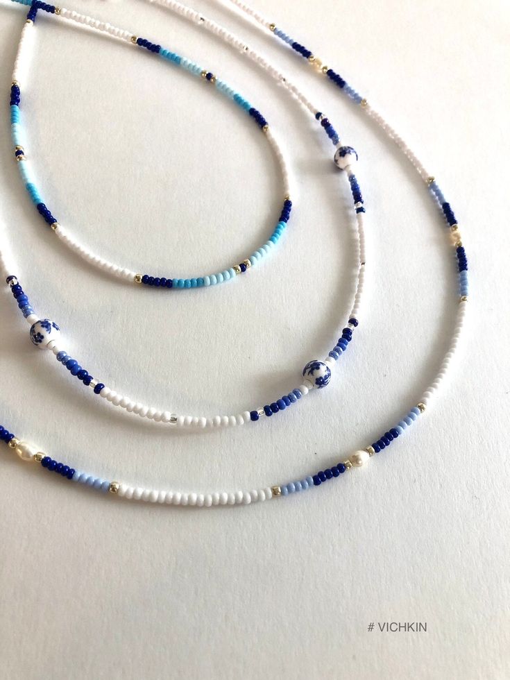 "Dainty Blue beaded necklaces with fresh water pearles and gorgeous porcelain beads in \"old money\" style.   Made with delicate high quality Czech glass seed beads. Get for yourself or gift to a friend. ♥   #vichkin #vichkindesign ↠ ABOUT    ▢  Size: about 15 inch, goes up to about 17 inch with chain extension.  ▢  Materials: 2mm / 3mm quality Czech glass seed beads  ▢  This item is handmade and may vary slightly from the picture, making every one completely unique.  ▢  Ready to ship. ↠ IMPORTANT The product is not suitable for young children. Please exercise child  Please check out my Jewelry Collection here: https://www.etsy.com/ca/shop/Vichkin?ref=seller-platform-mcnav§ion_id=22731346 Back to main page https://www.etsy.com/ca/shop/Vichkin All my items are handmade with love ♥  Natalie" Blue Spacer Beads Jewelry For The Beach, Blue Bohemian Pearl Necklace For Gift, Blue Beaded Necklaces For Jewelry Making In Summer, Hand-strung Blue Jewelry For Summer, Summer Blue Necklaces With Spacer Beads, Blue Hand-strung Jewelry For Summer, Summer Blue Hand-strung Jewelry, Bohemian Blue Pearl Necklace For Beach, Hand-strung Blue Beads For Beach