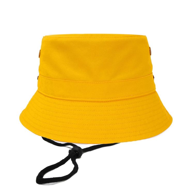 Step up your style game with the Dalix Bucket Hat, where comfort meets flair. Made from lightweight, breathable cotton, this hat offers sun-blocking shade while keeping you cool, thanks to its built-in air vents. The classic fit, paired with a customizable drawcord chin strap, ensures a snug, perfect fit for every head size, from Small to Extra Large. The unisex design makes it a versatile addition to anyone’s wardrobe, letting you mix and match it with anything from casual tracksuits to your fa Adjustable Fit Cotton Brimmed Bucket Hat, Casual Breathable Bucket Hat, Casual Solid Breathable Bucket Hat, Adjustable Cotton Bucket Hat With Uv Protection, Adjustable Fit Cotton Bucket Hat With Wide Brim, Adjustable Cotton Hats With Uv Protection, Adjustable Cotton Wide Brim Bucket Hat, Adjustable Cotton Bucket Hat With Wide Brim, Solid Hats With Uv Protection And Adjustable Fit