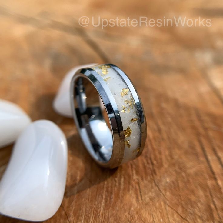 Each order is for one custom handmade ring handcrafted to order personally **for you** in the Upstate Resin Works LLC shop located in Upstate NY. The facets, sparkle and shine of each ring will be 100% unique while maintaining a look similar to the ring in the photos. This rings inlay is made using high quality tumbled snow white quartz with gold leaf inset within the quartz. The design was made to mimic the look of natural gold formations within quartz rock. The design can be be adjusted to mak Modern White Jewelry For Promise, Modern White Promise Jewelry, White Polished Finish Ring For Promise, White Ring With Polished Finish For Promise, White Polished Promise Ring, White Promise Ring With Polished Finish, Resin Works, Quartz Rock, Engagement Band