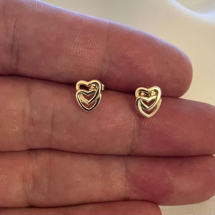 Genuine 9CT Yellow Gold Earrings - Double Heart Stud EARRINGS 375 Hallmarked - 0.48 Gram Gold Earrings - Gift Boxed Earring Material9ct Gold Weight0.48 Grams Post Lenght: 6mm All of our jewellery is professionally inspected, All items sold are Genuine Please do not Hesitate to contact me if you require any further Information or have any problems Any issues I will ensure that they are resolved with 100% customer satisfaction Gold Double Heart Earrings For Mother's Day, Heart-shaped Earrings For Anniversary, Double Heart Pierced Earrings For Mother's Day, Pierced Double Heart Earrings For Mother's Day, Valentine's Day Tarnish-resistant Round Earrings, Gold Double Heart Earrings For Anniversary, Hallmarked Heart Earrings For Valentine's Anniversary, Dainty Earrings For Valentine's Day Formal, Valentine's Day Anniversary Hallmarked Heart Earrings