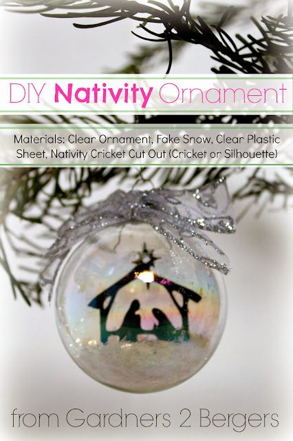 a christmas ornament hanging from a tree with the words diy nativity ornaments