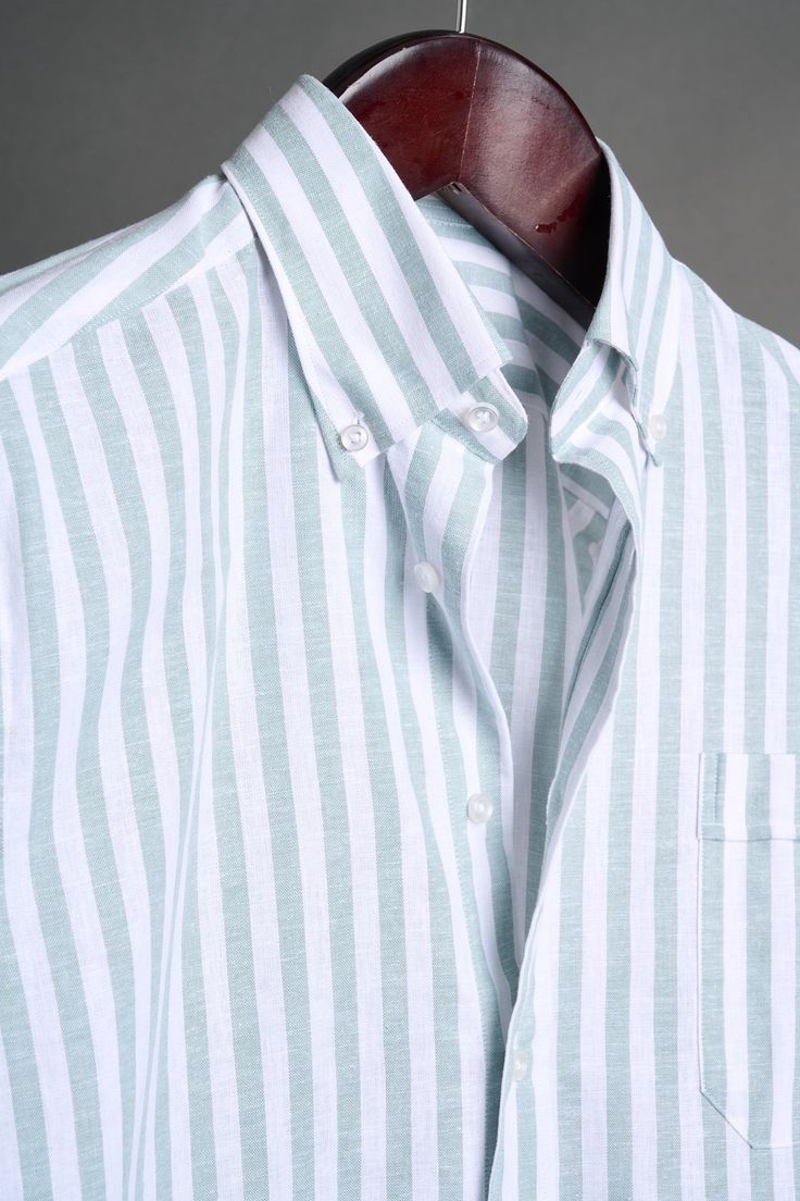 A bespoke shirt crafted from a textured cotton blend fabric in an oversized candy stripe. The larger striped pattern gives it a punch of style, making it a great casual shirt that can be worn with chinos or jeans - or under suits and jackets. The lightweight fabric drapes effortlessly, making it an ideal choice for those seeking a sophisticated yet relaxed look. White Relaxed Fit Yarn-dyed Shirt, Classic Striped Linen Tops, Classic Relaxed Fit Yarn-dyed Shirt, Classic Collared Yarn-dyed Shirt, Classic Yarn-dyed Button-up Shirt, Classic Yarn-dyed Shirt In Relaxed Fit, Classic Yarn-dyed Collared Shirt, Yarn-dyed Striped Collared Shirt, Classic Yarn-dyed Tops With Relaxed Fit