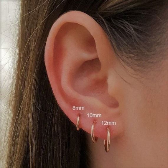 Our non tarnish gold Vermeil sleeper hoops are the perfect everyday addition to your ears! ♥️ Real Gold-Plated Sterling Silver (Vermeil) Hoops ♥️ Hypoallergenic ♥️ The perfect, everyday hoops ♥️ Choose your size ♥️ 1.2mm thickness ♥️ Small and Easy to put in ♥️ Free gift bag included, ready for gifting straightaway  This listing is for 1 hoop earring, if you need a pair please buy 2  For any more questions - please message me x Free Shipping! (UK ONLY) 1st class to UK. Tracked & Signed to International Locations. Please select TRACKED delivery to UK for Guaranteed delivery.  By using the free 1st class large letter postage you are agreeing that I am not responsible for lost items in the post. Please be aware that, unfortunately, I cannot offer refunds for post that is lost in the mail unle Dainty Stackable Small Hoop Earrings, Dainty Small Hoop Stackable Earrings, Dainty Everyday Stackable Cartilage Earrings, Dainty Hypoallergenic Hoop Cartilage Earrings, Dainty Stackable Small Hoop Cartilage Earrings, Dainty Small Hoop Stackable Cartilage Earrings, Everyday Hypoallergenic Rose Gold Cartilage Earrings, Simple Small Hoop Hypoallergenic Cartilage Earrings, Simple Hypoallergenic Small Hoop Cartilage Earrings