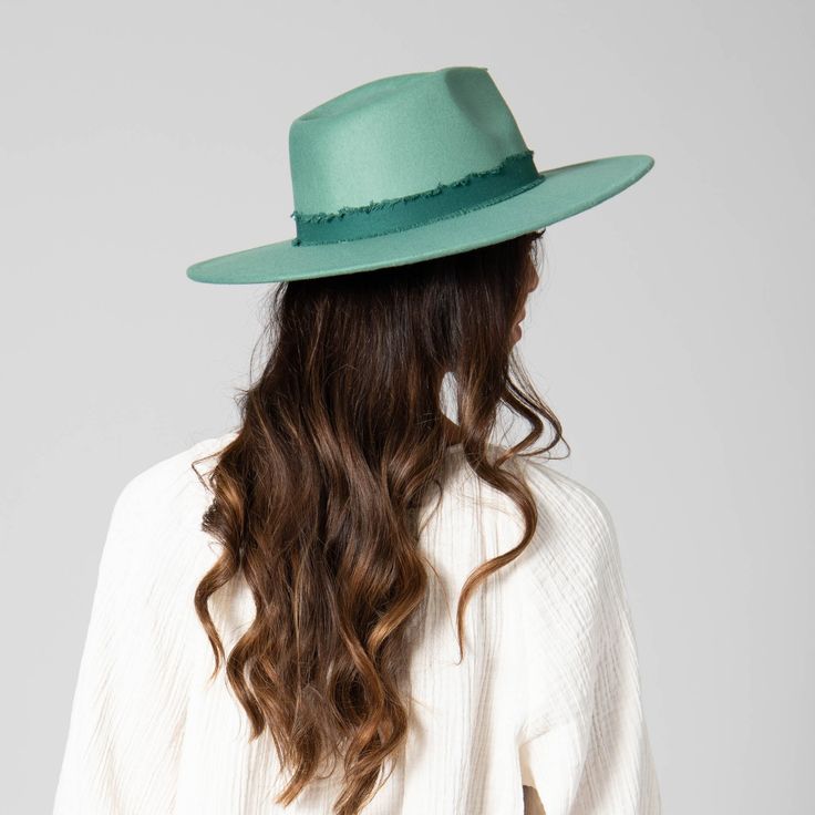 Faux felt fedora with tonal frayed cotton band. Features: Color: Teal, Pink, WhiteMaterial: 100% PolyesterBrim Size: 3.75"Women's One Size: 57cmUPF 50 Wide Brim Hat Summer, Sand Collection, Facebook Style, Fall Hats, Felt Fedora, Teal And Pink, Dress Hats, Wide Brimmed Hats, Brim Hat