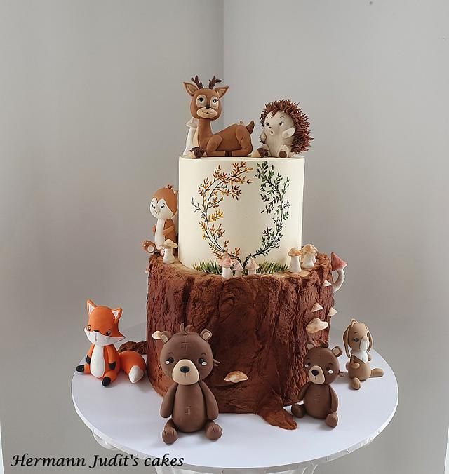 there is a cake with animals on it