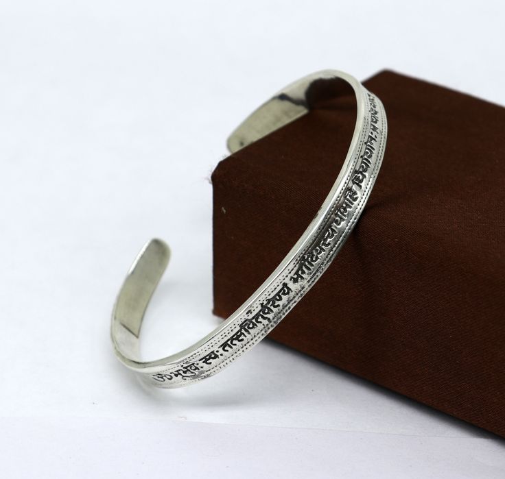 "This bangle is beautifully designed like vintage antique traditional jewelry of india, made by 925 sterling silver, we can easily adjust size, excellent gifting tribal jewelry from india. Metal-925 sterling silver. Item Type-Cuff kada bracelet. Weight-16.420 grams Size-2-8or 2.5\" (easy to adjust) Width-0.7 centimeters. Stamped-925. Finish-Oxidized. Makes excellent gifting for birthday, wedding, anniversary, Christmas day, valentines day. mother's day." Adjustable Spiritual Bracelet With Intricate Design, Adjustable Spiritual Bracelets With Intricate Design, Adjustable Sterling Silver Bangle With Intricate Design, Adjustable Intricate Sterling Silver Bangle Bracelet, Traditional Bangle Cuff Bracelet Gift, Adjustable Metal Bangle With Intricate Design, Adjustable Engraved Sterling Silver Bangle Bracelet, Adjustable Intricate Design Cuff Bracelet For Ceremonial Occasions, Adjustable Engraved Sterling Silver Bangle