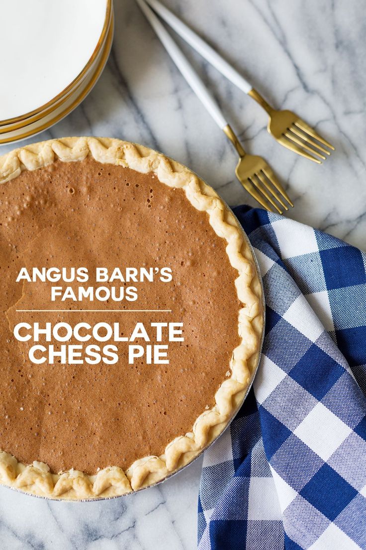 a chocolate pie with the words angus barn's famous chocolate cheese pie on it