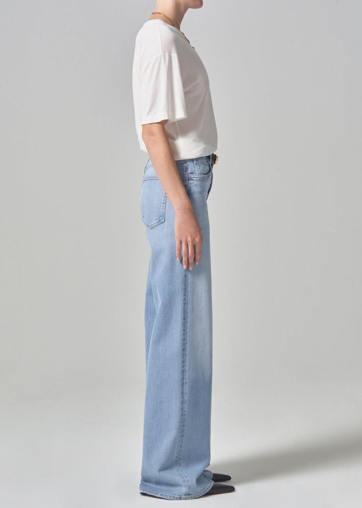 The Loli features an ultra-flattering mid-rise waist that sits higher up on the hip with an easy, relaxed wide leg. The 32" inseam lengthen the leg for a look that can be easily dressed up or down. This fit is true to size. Looks Like: Light indigo with fading and finished hems Feels Like: Signature soft stretch denim designed to hold its shape all-day From our HUMANITY Collection Classic High-rise Spring Wide Leg Pants, Classic High-rise Wide Leg Pants For Spring, Classic High Rise Wide Leg Pants For Spring, Versatile Wide Leg High Waist Pants For Elevated Casual, Elevated Casual High Waist Wide Leg Pants, Mid-rise Wide Leg Pants For Everyday Fall Wear, Classic Mid-rise Wide Leg Pants For Spring, Elevated Casual Wide Leg Bottoms, Classic Mid-rise Wide Leg Pants With Five Pockets