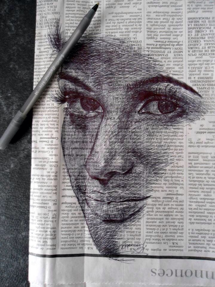 a pencil drawing of a woman's face on top of an old book page