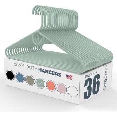 a pack of hangers sitting on top of a box