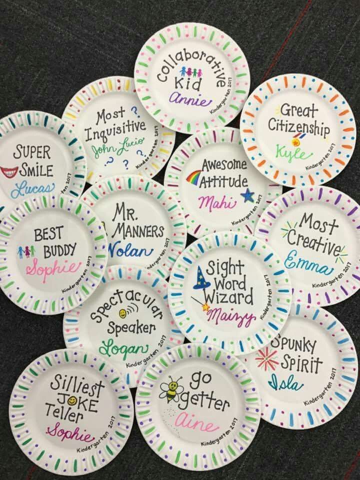 paper plates with words written on them are arranged in the shape of a circle and have different colors