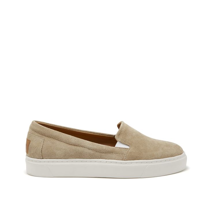 Slip-on contemporary style sneakers for women in taupe suede by Hugs & Co. Ultimately comfortable sneakers with an taupe suede upper and crisp white Vibram sole. Featuring our signature full leather lining for luxurious comfort and long lasting shape. Made in Portugal 100% Suede Upper featuring a 100% Leather Lining Rubber sneaker sole by Vibram