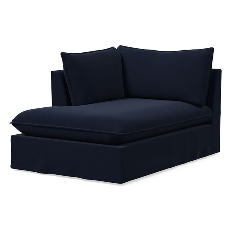 an image of a blue couch with pillows on the bottom and back cushions upholstered