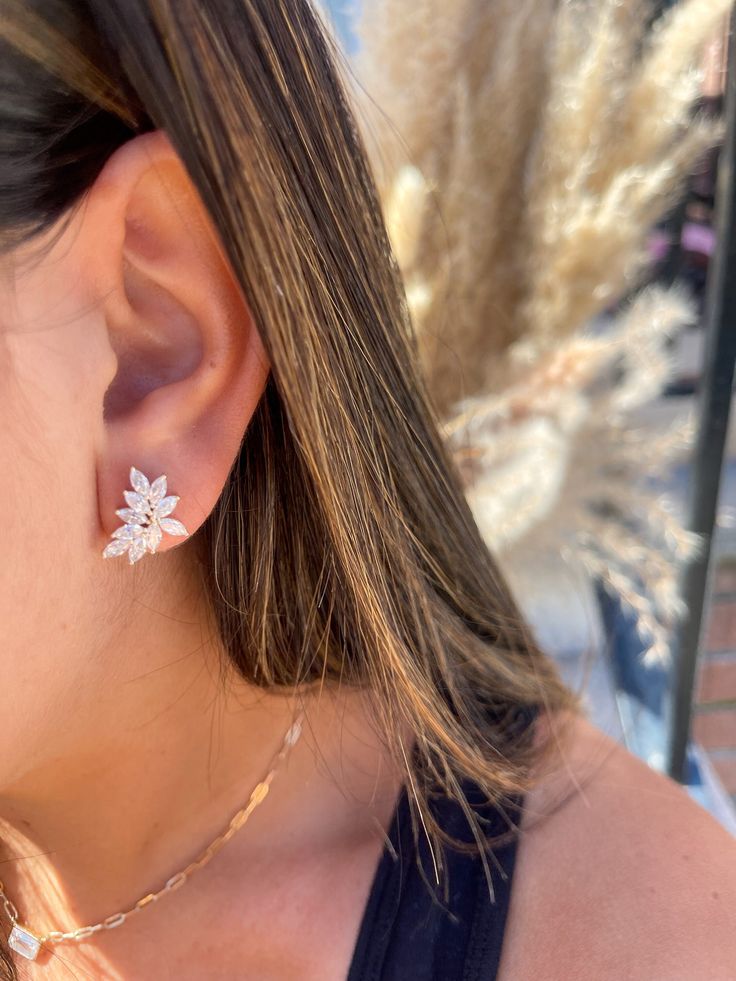 This piece of jewelry is the perfect combination of vintage and modern creating a timeless statement. Each earring features 10 marquise shaped moissanites that are carefully set in a delicate cluster. These Classic and exquisite earrings are truly fit for royalty! *Details: *Metal Types Available: 14K Yellow Gold 14K White Gold 14K Rose Gold Size: 12x16mm Marquise size: 2.5x6mm TCW (20 Marquise): 2.9CT 14K Gold Weigh: 3.5g Post Length: 9mm Post Width: 0.8mm *Closure: Push back *Stone Type: Moissanites *Shape: Marquise *Color Grade: DEF Colorless *Clarity Grade: VS *Handmade and High Quality  *All items will be packaged in a high-quality Jewelry box!  *SHIPPING: We are located in NY and we offer various shipping options! If we have the item in stock it will be shipped within 3-5 business da Timeless Diamond Cut Diamond Earrings For Wedding, Timeless Diamond Cut Earrings For Wedding, Timeless Diamond Earrings For Wedding, Timeless Diamond Wedding Earrings, Elegant Diamond Earrings For Wedding, Elegant Marquise Diamond White Diamond Earrings, Timeless Sterling Silver Diamond Earrings For Wedding, Luxury Diamond Cut Earrings For Wedding, Timeless Diamond Drop Earrings For Wedding