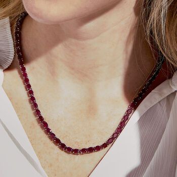 Ross-Simons - 40.00 ct. t. w. Ruby Tennis Necklace in Sterling Silver. 18". Wrap yourself in the rich luxury of rubies. This tennis necklace offers 40.00 ct. t. w. oval rubies in polished sterling silver. Imagine how stunning it would look with a white blouse or sweater! Polished finish. Double-latch safety. Box clasp, ruby tennis necklace. Ruby birthstones are the perfect gift for July birthdays. Formal Single Strand Emerald Necklace, Formal Gemstone Tennis Necklace, Elegant Ruby Jewelry With Gemstone Beads, Elegant Oval Gemstone Beads Jewelry, Classic Ruby Necklace With Diamond Cut, Classic Gemstone Tennis Necklace - Gift, Luxury Oval Gemstone Beads Jewelry, Formal Ruby Gemstone Necklaces, Classic Ruby Necklaces For Formal Occasions