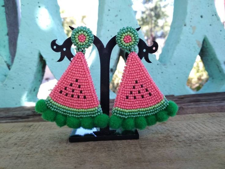 These watermelon slice earrings would make a perfect and unique gift for family, friend, or yourself. If you like these bead embroidery earrings, but would like them in a different color please email me because I do special orders. ★DIMENSIONS: 7.5*4.5 cm (2.95*1.77 Inches) ★READY TO SHIP Made with love and care about you!♥ ★The colors can slightly differ from the photo because of photography lighting and monitor settings. ★ESTIMATED SHIPPING TIMES: North America: 2-4 weeks Europe: 1-3 weeks Aus Handmade Watermelon Colored Dangle Jewelry, Handmade Watermelon Color Dangle Jewelry, Fun Green Fruit Design Earrings, Green Fruit Design Fun Earrings, Handmade Cute Summer Jewelry, Cute Handmade Adjustable Beaded Earrings, Green Handmade Fun Earrings, Handmade Playful Earrings For Summer, Playful Handmade Earrings For Summer