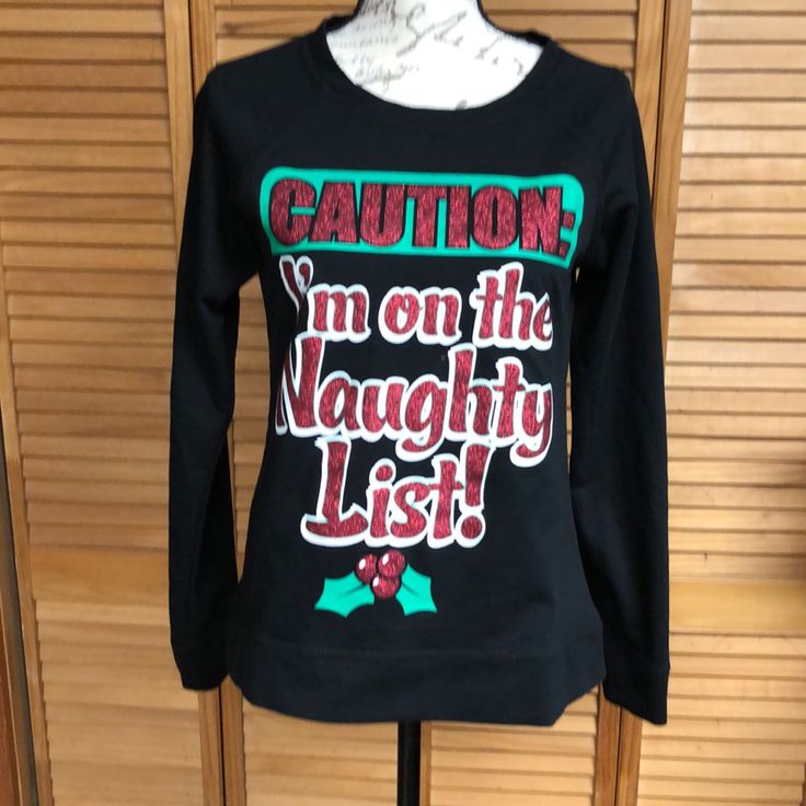 Caution I’m On The Naughty List! Christmas T-Shirt For Juniors. Nwot Black Holiday Tops With Letter Print, Black Holiday Top With Letter Print, Black Tops With Letter Print For Holiday, Black Christmas Tops With Text Print, Black Tops With Text Print For Christmas, Black Text Print Top For Christmas, Black Crew Neck Top For Holiday, Black Christmas Graphic Tee, Tops Long Sleeve