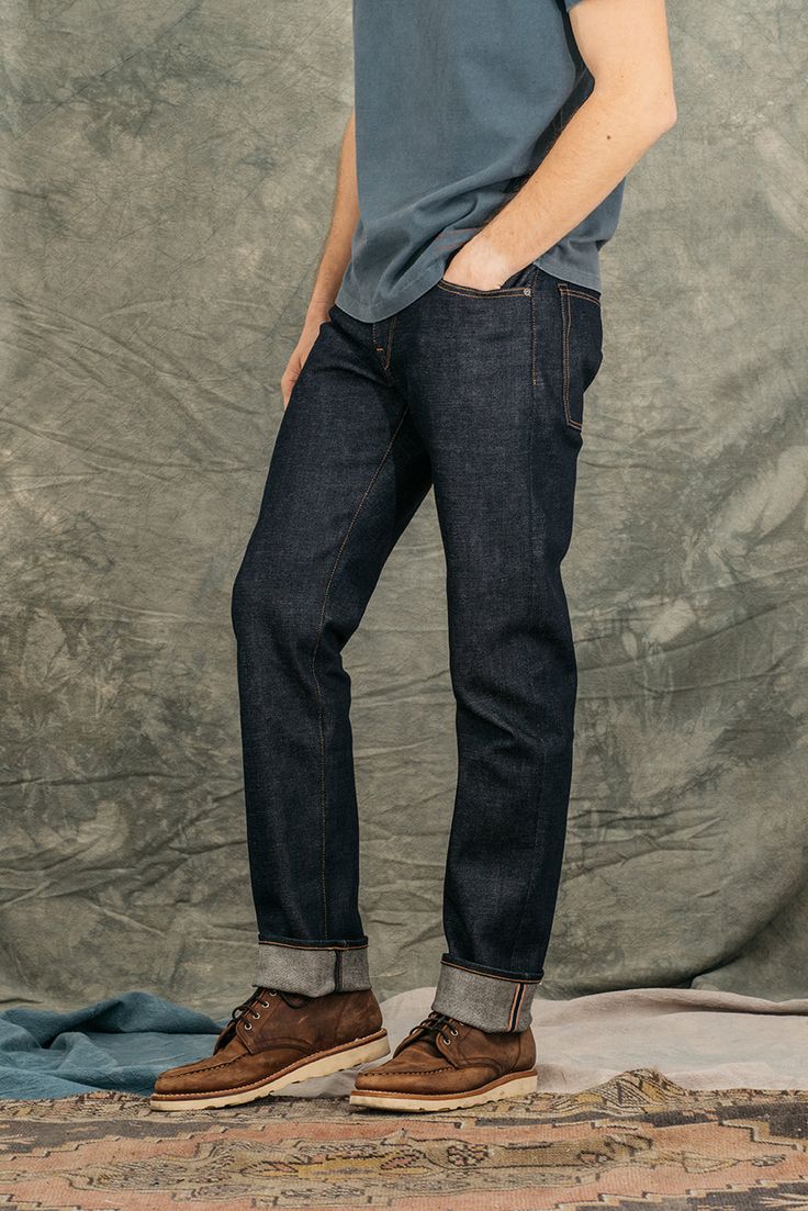 Straight Fit Indigo Raw 14oz What is denim weights? 96% COTTON / 4% POLYURETHANE 4-Way stretch Selvedge (Self-edge) Made in USA Model is 6'2" and wearing a size 32. Our premium denim is inspired by the classic vintage blue jean. Our Premium Japanese 4-Way Stretch Selvedge denim story starts in Japan where our fabric is developed at one of the oldest denim mills. We blend a unique 4 way stretch material with selvedge denim to create a specific amount of stretch and comfort you wouldn’t typically Fitted Indigo Jeans With Tapered Leg, Fitted Indigo Straight Leg Jeans, Fitted Straight Leg Indigo Jeans, Tapered Leg Indigo Jeans In Recycled Denim, Indigo Tapered Leg Jeans In Recycled Denim, Slim Fit Selvedge Cotton Jeans, Slim Fit Selvedge Jeans, Indigo Cotton Jeans With Standard Cut Leg, Fitted Selvedge Cotton Jeans