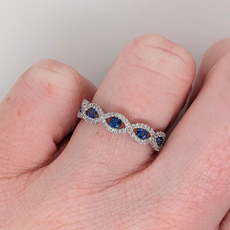 This beautiful sapphire band is perfect for wearing by itself or stacking with other rings or bands! The occasions to show off this band are endless - mother's day, graduation, wedding, birthday, date night, Christmas, etc. :) Blue Gemstone Ring, Birthday Date, Designer Silver Jewellery, Blue Gemstone Rings, Sapphire Band, Jewelry Showcases, October Birthstone, Stackable Ring, Blue Gemstones