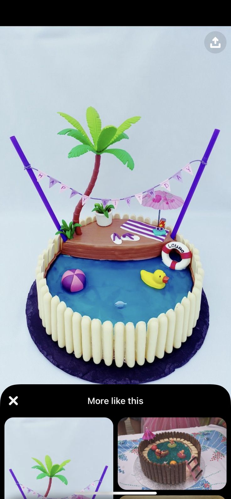 the cake is decorated with palm trees and beach scenes on it, along with other decorations