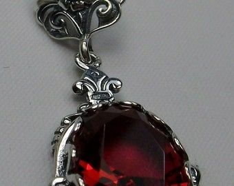 Ruby Pendant/ Solid Sterling Silver/ 9ct Simulated Red Ruby - Etsy Classic Red Jewelry As A Gift, Classic Red Engraved Jewelry, Antique Engraved Red Jewelry, Red Engraved Antique Jewelry, Vintage Ruby Necklace For Formal Occasions, Red Victorian Necklace For Anniversary, Red Victorian Engraved Jewelry, Vintage Red Gemstone Necklace, Red Filigree Jewelry For Formal Occasions