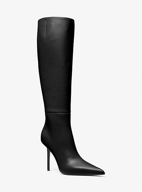 Equally sleek and sophisticated, our new Angelina boots first graced the runway with statement-making appeal for Fall/Winter 2024. Made in Italy from supple leather, this pointed-toe pair is designed in a knee-high silhouette and set on a striking tapered stiletto heel. Emulate the runway look with the season’s favorite knit turtleneck dress. Elegant Tall Boots For Workwear, Elegant Tall Boots For Work, Elegant Tall Heeled Boots For Workwear, Elegant Tall Heeled Boots For Work, Elegant Tall Knee-high Boots For Workwear, Tall Evening Boots For Fall, Elegant Tall Boots For Fall, Chic Tall Leather Knee-high Boots, Designer High Heel Knee-high Boots For Work