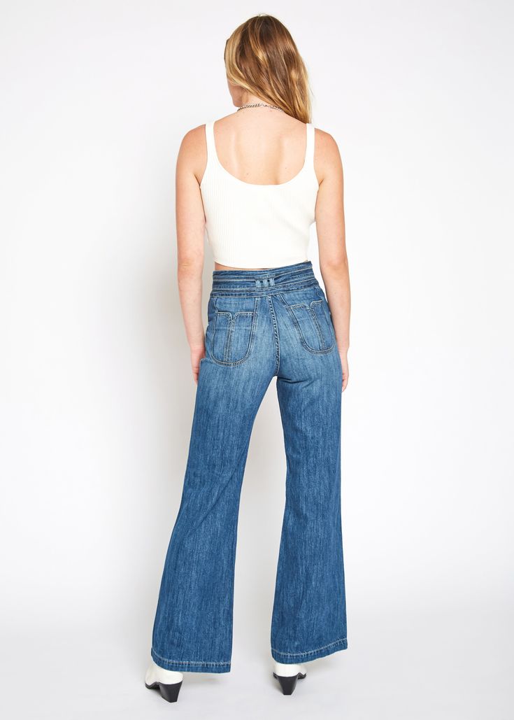 Belted high rise wide leg with fashion pocket and waistband. It is made from classic rigid denim in our bestselling classic blue wash with light fading and whiskering elements. Model is 5'10" wearing size 26. Approx. Rise: 13" Inseam: 33"Approx. Knee: 19 1/2" Leg Opening: 22" 100% Cotton Made in USA Fits true to size. Odessa, Independent Designers Fashion, Classic Blue, Tie Belt, Wide Leg Jeans, Bell Bottom Jeans, Leg Jeans, Wide Leg, High Rise