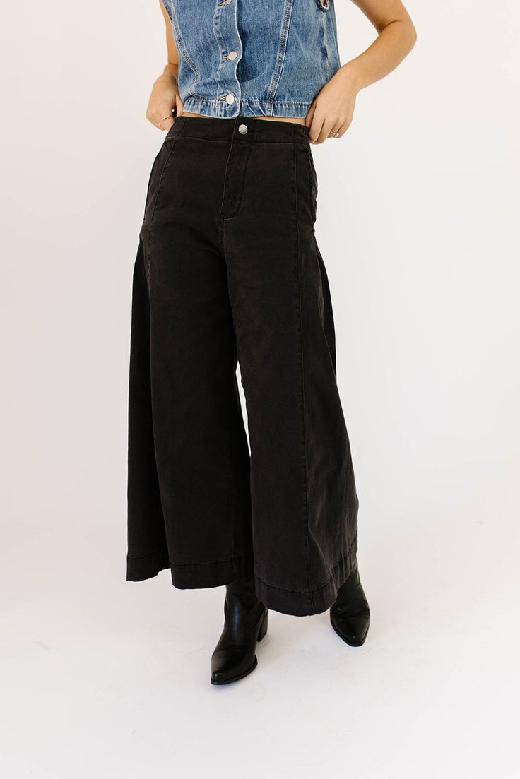 a pair of black wide-leg pants that are sooo good, you’ll never want to take them off. the high-rise + fitted waistline gives it “business casual” charisma, while the flowy loose legs keep things real + relaxed. full of versatility, you can dress them up or down for any occasion. black // wide leg, high waisted, one button zip fly, belt loops, pockets paired with our matilda mesh top + lover denim vest model is 5'8" + wearing a small measurements are approximate + taken while laying flat small : Fall High-waisted Wide Leg Pants For Elevated Casual, High Waist Wide Leg Pants For Fall, High Waist Wide Leg Pants For Elevated Casual Fall, Chic High Rise Wide Leg Pants For Fall, High Rise Wide Leg Pants For Fall Workwear, Black Wide-leg Pants For Date Night, High Rise Wide Leg Pants For Elevated Casual Fall, Black Wide Leg Flare Jeans For Work, Chic High-waisted Pants For Elevated Casual Occasions