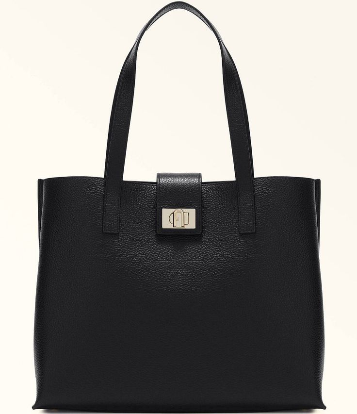 From Furla&#x2C; the 1927 Large 36 Soft Tote Bag features:Grained leatherCentral partition with zip closureTwist closure with the Furla logo engraved on the front Spacious and versatileMetal feet Approx.: 14.17" L x 11.22" H x 5.70" WImported. Classic Bags With Double Handle And Logo Hardware, Classic Bags With Logo Hardware And Double Handle, Leather Business Bags With Logo Hardware, Business Tote Bag With Logo Hardware, Classic Rectangular Shoulder Bag With Logo Hardware, Elegant Tote Bag With Logo Hardware, Classic Everyday Shoulder Bag With Logo Hardware, Classic Top Handle Bag With Logo Hardware, Classic Travel Bags With Logo Hardware