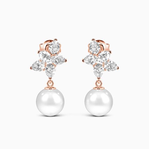 Embrace elegance and charm with these exquisite drop earrings. A dazzling cluster of pear-cut gemstones sits above each radiant pearl, their design blending classic sophistication with a contemporary flair. Effortlessly versatile, this eye-catching combination is the perfect accessory for any occasion requiring understated luxury. Subtle yet striking, the drops will light up your features with their lovely brilliance. *Each piece is handmade, resulting in a potential variance of 0.1-0.2mm during Elegant Pear-shaped Cluster Earrings For Formal Occasions, Elegant Cluster Bridal Earrings For Anniversary, Elegant Anniversary Cluster Bridal Earrings, Elegant White Cluster Bridal Earrings, Elegant Teardrop Cluster Earrings In White Gold, Elegant Teardrop Cluster Earrings For Formal Occasions, Elegant Teardrop White Gold Cluster Earrings, Elegant White Gold Teardrop Cluster Earrings, Elegant Pear-shaped Cluster Earrings For Anniversary