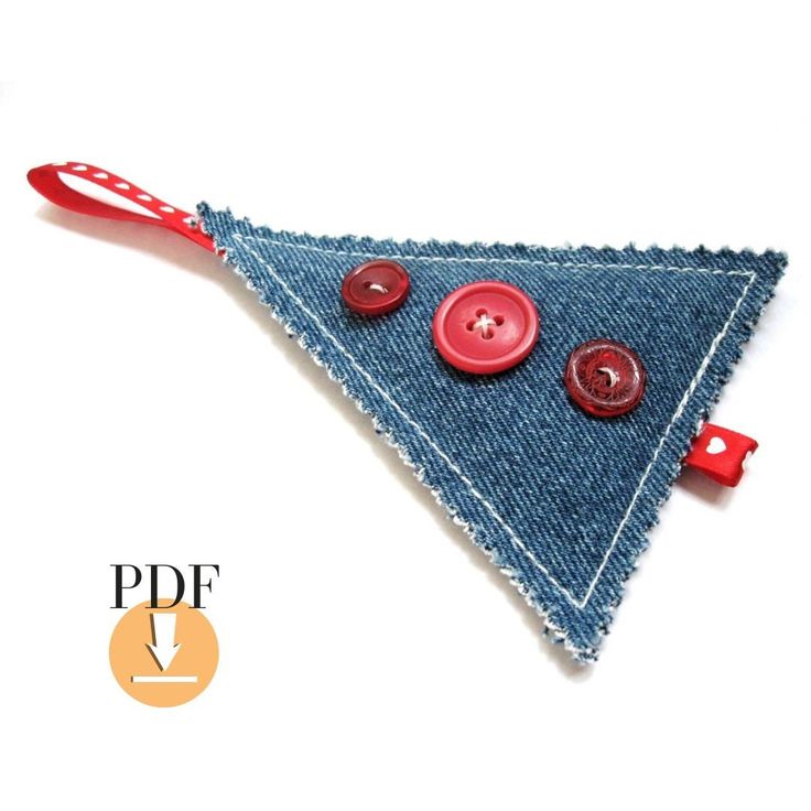 a denim triangle with buttons attached to it