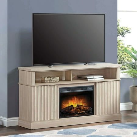 an entertainment center with a fireplace and flat screen tv mounted on it's side