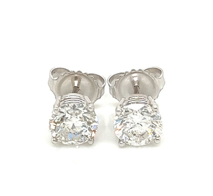 These 14K white gold stud earrings feature 1.99 TCW of brilliant cut diamonds for a timeless classic look. Their understated elegance makes them a great addition to any jewelry collection. Quality craftsmanship and diamonds of exceptional clarity provide long-lasting shine with one-of-a-kind sparkle. EG-146 Formal Diamond White Platinum Diamond Earrings, Formal Platinum Diamond White Diamond Earrings, Classic Platinum Earrings For Formal Occasions, White Gia Certified Diamond Earrings For Formal Occasions, Formal Platinum Diamond Cut Earrings, Classic Diamond Cut Diamond Earrings For Formal Occasions, White Diamond Cut Earrings For Formal Events, Classic Brilliant Cut Earrings For Formal Occasions, Timeless White Brilliant Cut Earrings