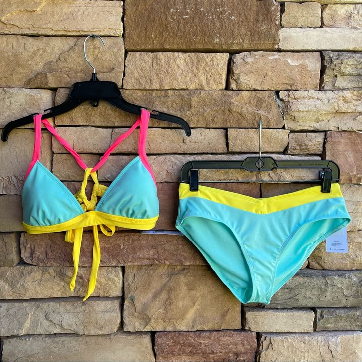 Nwt Hurley Color Block Bikini Swimsuit With An Aqua Green Base And Bright Yellow And Pink Trim And Straps. Strappy Tie Back. Flirty And Fun For Summer! Women’s Size Xl. Neon Yellow Swimwear For Spring Poolside, Spring Pool Swimwear In Neon Yellow, Neon Yellow Beachwear For Pool, Stretch Neon Yellow Swimwear For The Beach, Neon Yellow Stretch Swimwear For Beach Season, Neon Yellow Stretch Swimwear For Beach, Neon Yellow Triangle Top Swimwear For Pool, Neon Yellow Stretch Swimwear For Swimming, Neon Yellow Summer Swimwear For Pool